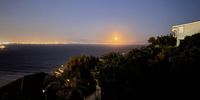 Near full moon rising over False Bay<br>