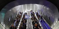 Israeli anti-government protesters use escalators inside a train station ahead of a mass protest against the government outside the parliament (Knesset) in Jerusalem, 20 February 2023. Thousands of people protest the government justice system reform plan.  EPA-EFE/ABIR SULTAN