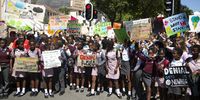 Pupils from 20 schools protest about the climate crisis outside Parliament in Cape Town in 2019. (Photo: Tessa Knight)