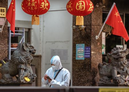 China urges 'patience' as Covid-19 cases rebound ahead of key congress