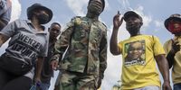 ANC supporters as songs of struggle is sung at a march at <br>Mary Fitzgerald Square in Newtown Johannesburg. The march was organised by the MKMVA in support of Jacob Zuma,  RET interests and Ace Magashule's attempted arrest.<br>Photo / Shiraaz Mohamed