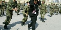 Soldiers in Azerbaijan beat an opposition supporter after Ilham Aliyev won unfair elections in 2003. The same ruler remains in power today (Photo: Oleg Nikishin / Getty Images)