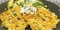 Savoury rice waffles with avocado, spring onion, cheddar cheese and crème fraîche. (Photo: Tony Jackman)<br>