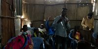 Kevin addresses a crowd of journalists and activists visiting the Wasafy offices in Mathare.