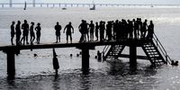  People enjoy a swim during a hot summer day in Malmo, southern Sweden, 27 June 2024. A heat wave has brought the hottest temperatures so far this year and air temperatures crossed the 30-degree Celcius mark.  EPA-EFE/Johan Nilsson  SWEDEN OUT