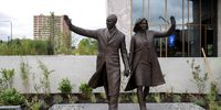  Statues of former US president Barack Obama and former first lady Michelle Obama are seen outside the Barack Obama Presidential Center 