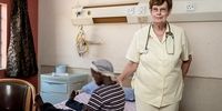 04/11/2021  Marlisa Van Rensburg with a patient at the Tshepong tuberculosis (TB) unit.(Photo: Thom Pierce/Spotlight)