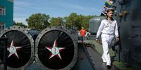 A Russian Navy sailor passes missile tubes aboard the Parchim class corvette Kalmykia MPK 229 Baltic Fleet warship during Russian Navy day at the Vistula lagoon in Baltiysk, Russia, on Sunday, July 31, 2016. Amid Russia's recent rearmament, the Kaliningrad region has increasingly returned to its Soviet-era role as a garrison on the strategic Baltic Sea coast. Photographer: Andrey Rudakov/Bloomberg via Getty Images