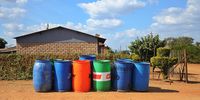 Residents of Hlanganani put empty drums in the street hoping a municipal truck will stop to fill them up with water. But the wait may take weeks or even months. (Photo: Lucas Ledwaba / Mukurukuru Media)