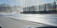 Water shoots into the air after a 375mm bulk water pipe burst on 3 August 2025 at the corner of Milner Avenue and John Adamson Drive in Montgomery Park, Randburg. (Photo: Julia Evans)