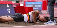 TOKYO, JAPAN - AUGUST 04: Thomas van der Plaetsen of Belgium lies injured in the sand pit after injuring himself in the men's decathlon long jump during the Athletics event on Day 12 of the Tokyo 2020 Olympic Games at the Olympic Stadium on August 04, 2021 Tokyo, Japan. (Photo by Roger Sedres/Gallo Images/Getty Images)