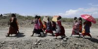 Kenyan women from the Maasai community take part in the Global Climate Strike in Magadi, Kajiado, Kenya, 25 March 2022. (Photo: EPA-EFE / Daniel Irungu)
