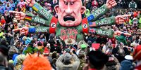 North Rhine-Westphalia, Duesseldorf: A motto float with the inscription "Putin's delusion" shows the leader of the Russian mercenary force Wagner Prigozhin referring to Nazis all over the world. D¸sseldorf is hosting its first Rose Monday parade in three years; in 2021 and 2022, the parades were canceled due to Corona. Photo: Federico Gambarini/dpa (Photo by FEDERICO GAMBARINI / DPA / dpa Picture-Alliance via AFP)