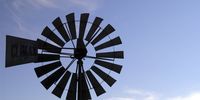 Calvinia, Northern Cape, Karoo, on the  R27 road. Close-up of a Climax wind pump silhouetted against blue sky. Image: Supplied