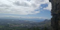 Rock climbing overlooking Cape Town.