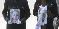 epaselect epa09912592 The photo of three-month-old Kira during the funeral ceremony for Kira, her mom Valeria and grandmother Lyudmila in the South Ukrainian city of Odesa, 27 April 2022. Eight people were killed including a three-month-old child and about 20 were wounded during the shelling of a residential building in Odesa on 23 April 2022. Russian troops entered Ukraine on 24 February resulting in fighting and destruction in the country and triggering a series of severe economic sanctions on Russia by Western countries.  EPA-EFE/STEPAN FRANKO