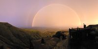 Golden Gate surprise- twilight rainbow over the valley. Photographer: Dawie Bosch