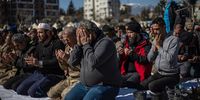 epaselect epa10472535 People attend the Friday prayer at a shelter tent camp after a powerful earthquake, in Hatay, Turkey, 17 February 2023. Almost 44,000 people have died and thousands more are injured after two major earthquakes struck southern Turkey and northern Syria on 06 February. Authorities fear the death toll will keep climbing as rescuers look for survivors across the region.  EPA-EFE/MARTIN DIVISEK