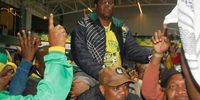 Newly elected KZN ANC provincial secretary Bheki Mtolo carried to the podium by his comrades after his election at the parties conference in Durban 24 July 2022, Photo; Phumlani Thabethe