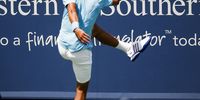 Novak Djokovic kicks at a ball in frustration during his play against Tommy Robredo of Spain in their third round match of the Western & Southern Open tennis tournament at the Linder Tennis Centre in Mason, Ohio, US in 2014. (Photo: EPA-EFE / Tannen Maur)