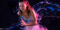 'Dynamic Athlete'. To demonstrate the dynamic nature of this young Swiss athlete I worked with water splashes and gelled lights. © Sandra Handschin, Switzerland, Winner, National Awards, Sony World Photography Awards 2023