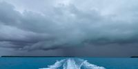 Outrunning a tropical storm in the South Pacific. Photographer: Nicola Parianos