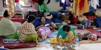 Members of an Indian refugee family rest at a relief camp near Imphal, the capital of Manipur state, India, 09 October 2023. Since May 2023, Manipur has been rocked by mob violence between the ethnic groups Meiteis and Kukis. The clashes have claimed 175 lives over four months and at least 96 bodies are still lying unclaimed, the Manipur Police said.  EPA-EFE/PIYAL ADHIKARY