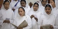 epa10139243 Nuns take part in a mass prayer near Mother's tomb at Mother House on Mother Teresa's 112th birth anniversary in Kolkata, India, 26 August 2022 . Mother Teresa was born Agnes Gonxha Bojaxhiu on 26 August 1910 in Skopje, Macedonia. She began her missionary work with the poor in Kolkata in 1948, and won the Nobel Peace Prize in 1979. Mother Teresa was canonized as a saint by Pope Francis in 2016.  EPA-EFE/PIYAL ADHIKARY