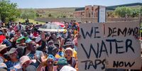 Residents of Phumla Mqashi informal settlement in Lenasia South marched from the Golden Highway to Lenasia South Civic Centre on 2 December 2024 to demand access to clean, running water from communal taps. (Photo: Julia Evans)