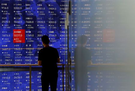 Asia stocks slide, gold hits record high on US tariffs