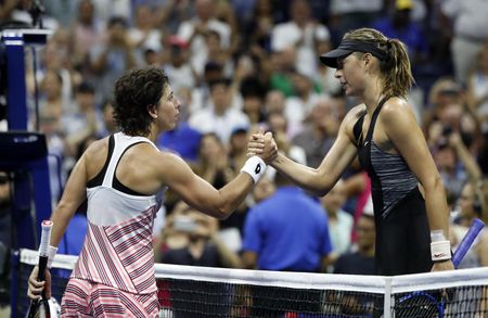 Sharapova crashes at US Open to Suarez Navarro