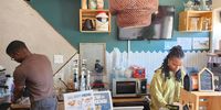 Lulu Adeyanju photographed preparing a lox bagel at Ko Cafe. (Photo: Naomi Campbell)<br>