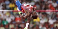 TOKYO, JAPAN - AUGUST 01: Shelby McEwen of Team United States competes in the Men's High Jump Final on day nine of the Tokyo 2020 Olympic Games at Olympic Stadium on August 01, 2021 in Tokyo, Japan. (Photo by Cameron Spencer/Getty Images)