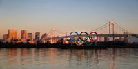 TOKYO, JAPAN - JANUARY 20: The Olympic rings are seen in front of Tokyo's iconic Rainbow Bridge and Tokyo Tower at Odaiba Marine Park on January 20, 2020 in Tokyo, Japan. (Photo by Clive Rose/Getty Images)