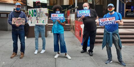 New Yorkers line the streets; queuing, singing, dancing, voting