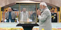 epa10439883 A handout photo made available by the Indian Press Information Bureau (PIB) shows Indian Prime Minister Narendra Modi paying tributes to Mahatma Gandhi on his 75th Death Anniversary at Mahatma Gandhi's memorial in Rajghat, New Delhi, India, 30 January 2023. The event marks the memory of the 'Father of the Nation' Mahatma Gandhi, who was assassinated on 30 January 1948.  EPA-EFE/INDIA PRESS INFORMATION BUREAU HANDOUT  HANDOUT EDITORIAL USE ONLY/NO SALES