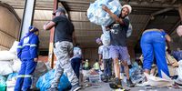 At the Paarl material recovery facility, a team of 25 waste pickers works in unison to separate and collate recycling material.<br>(Photo: Ashraf Hendricks)