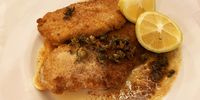 The brains and sweetbreads were done with lemon butter and capers. (Photo: Tony Jackman)<br>