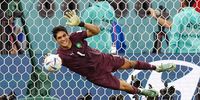  Yassine Bounou goalkeeper of Morocco stops the third penalty kick during the FIFA World Cup Qatar 2022 Round of 16 match between Morocco and Spain at Education City Stadium on December 6, 2022 in Al Rayyan, Qatar. (Photo by Khalil Bashar/Jam Media/Getty Images)