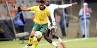 (L-R) Sipho Percevale Mbule of South Africa is challenged by Wilfred Ndidi of Nigeria during the 2026 FIFA World Cup qualifier match between South Africa and Nigeria at Toyota Stadium on September 09, 2025 in Bloemfontein, South Africa. (Photo: Charlé Lombard / Gallo Images / Getty Images)