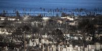 epa10998627 An entire neighborhood in ruins overlooks the ocean after the Lahaina Fire swept through the city of Lahaina, Hawaii, USA, 16 August 2023.  According to Maui County officials, at least 106 people were killed in the Lahaina wildfire that burnt in Maui, which is considered the largest natural disaster in Hawaii's state history.  EPA-EFE/ETIENNE LAURENT