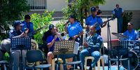 Cameron Hendricks from the City of Cape Town Law Enforcement band singing for the children at Red Cross Children's Hospital on 21 December, 2023. (Photo: Ziyanda Duba)