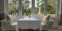 A table at the Verandah, soon to be given a touch of smoke. (Photo: Tony Jackman)<br>