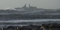 A South African Navy frigate in rough seas off Kommetjie, Cape Town on 20 September 2023. Three South African Navy personnel died and five were rescued in a submarine disaster off Kommetjie. (Photo: Gallo Images / Brenton Geach)