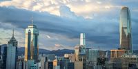 Late afternoon rain clouds gathering over Hong Kong. Photographer: Con Fauconnier
