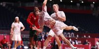 TOKYO, JAPAN - JULY 30: Mathias Gidsel of Team Denmark shoots and scores a goal during the Men's Preliminary Round Group B handball match between Portugal and Denmark on day seven of the Tokyo 2020 Olympic Games at Yoyogi National Stadium on July 30, 2021 in Tokyo, Japan. (Photo by Dean Mouhtaropoulos/Getty Images)