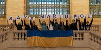 NEW YORK, NY - MARCH 23: People gather at Grand Central Station for a "Save Mariupol rally on March 23, 2022 in New York City.  Mariupol, an important industrial port city to Ukraine, has been pummeled by airstrikes and, according to city officials, 2,000 people are dead and 80% of residential homes have been destroyed. (Photo by David Dee Delgado/Getty Images)