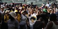 ANC supporters sing during former president Thabo Mbeki ’s walkabout at Jabulani Mall in Soweto. (Photo: Felix Dlangamandla)