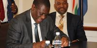 ANC deputy President Paul Mashatile signs the oath of parliament. (Photo: Velani Ludidi)