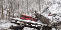 PITTSBURGH, PA - JANUARY 28: Vehicles including a Port Authority bus are left stranded after a bridge collapsed along Forbes Avenue on January 28, 2022 in Pittsburgh, Pennsylvania. At least 10 people were reportedly injured in the early-morning collapse, hours ahead of a scheduled visit by President Joe Biden to promote his infrastructure plan. (Photo by Jeff Swensen/Getty Images)